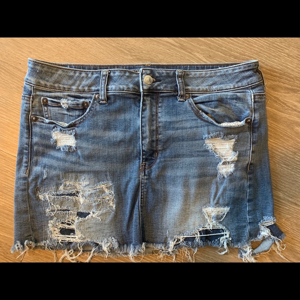 Distressed denim skirt